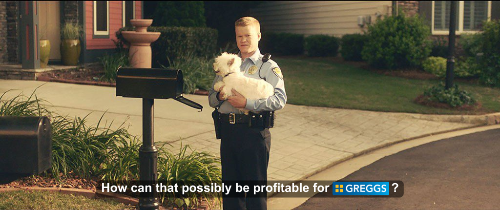 Meme from the film Game Night. Jesse Plemons as a cop holding a dog by a mailbox. Subtitle: "How can that possibly be profitable for Greggs?"