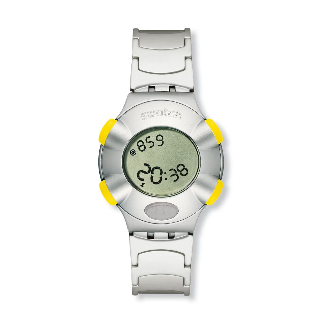 A Swatch digital watch with 24-hour time and .beats.
