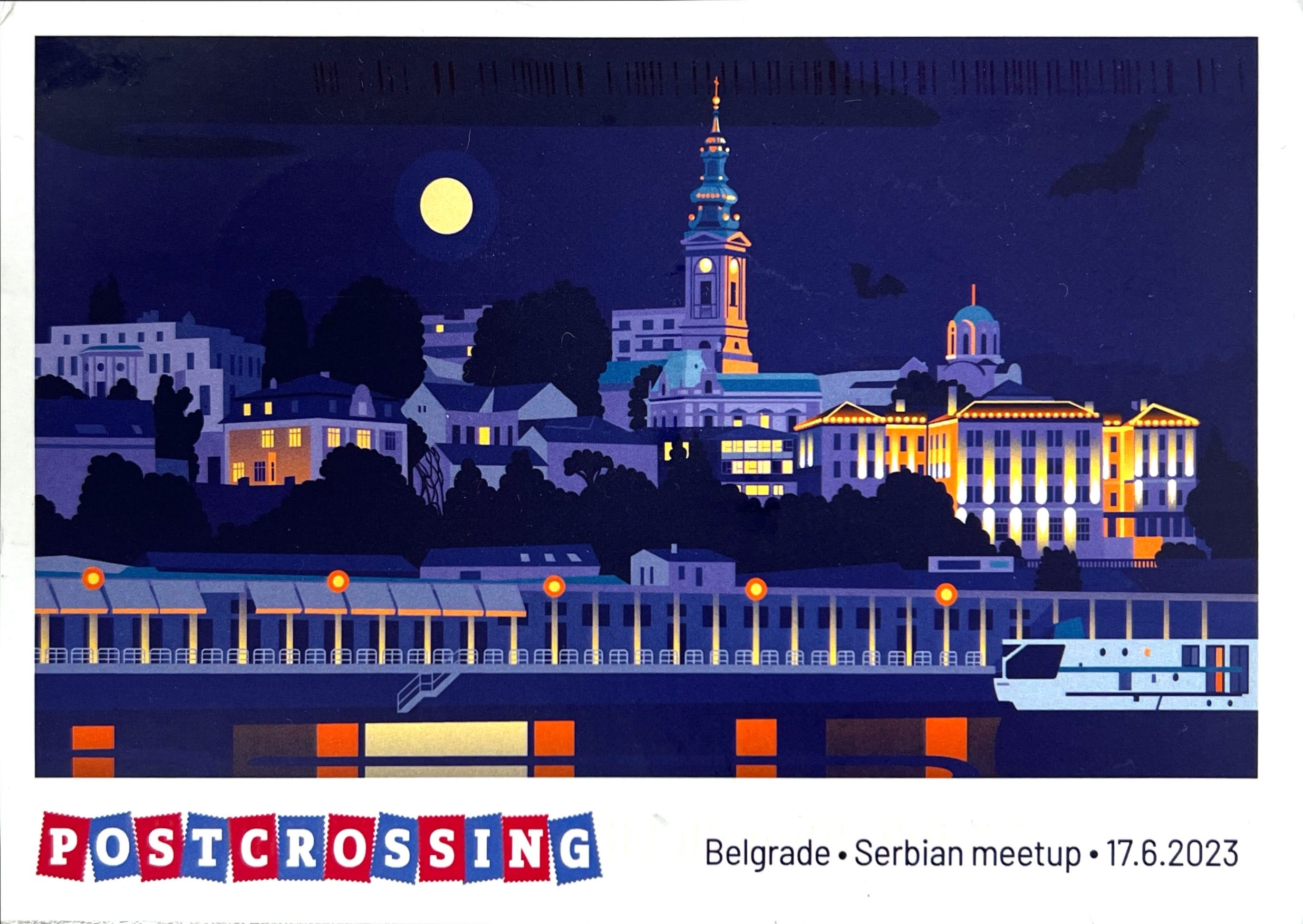 Illustration of city at night, with train in foreground. Postcrossing logo and caption "Belgrade, Serbian meetup, 17.6.2023"