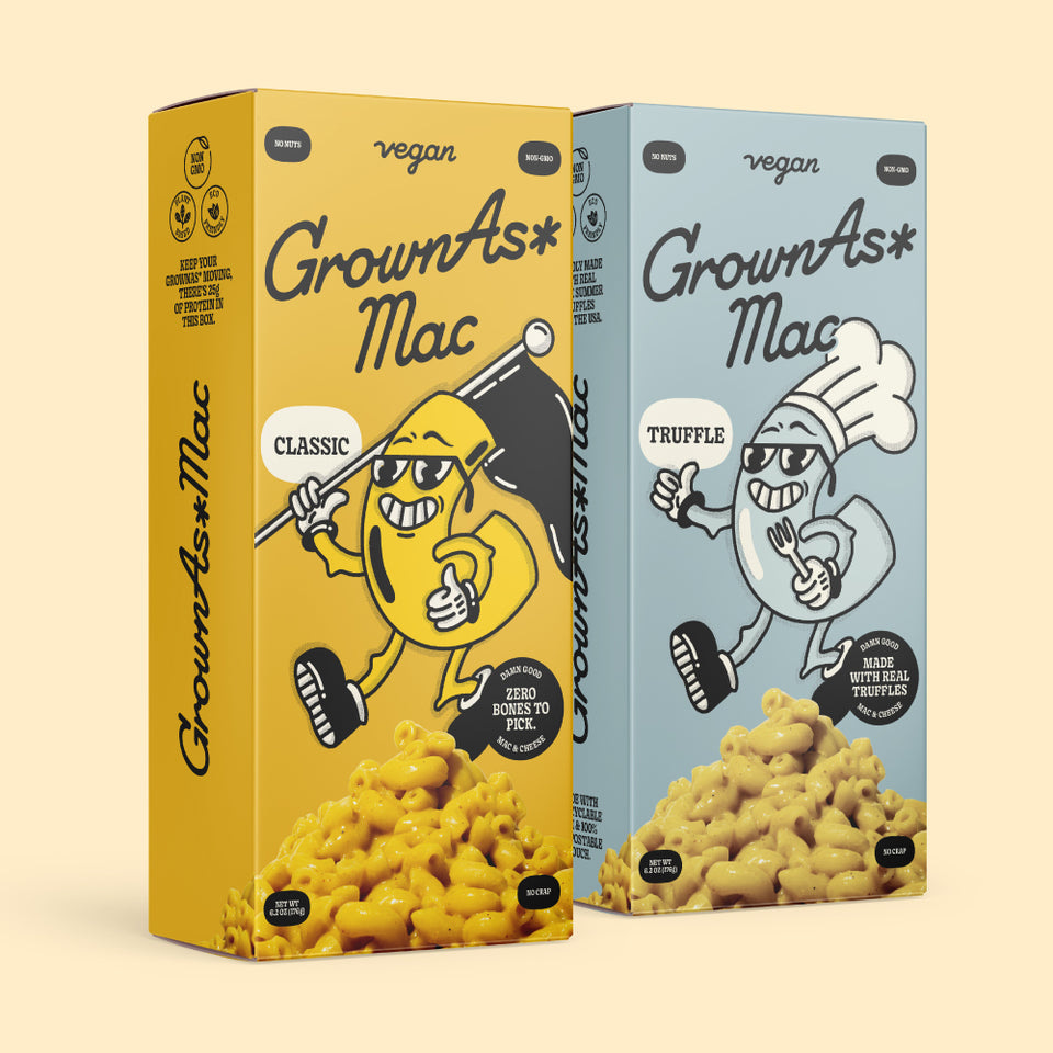Two boxes of "GrownAs* Mac" macaroni and cheese.