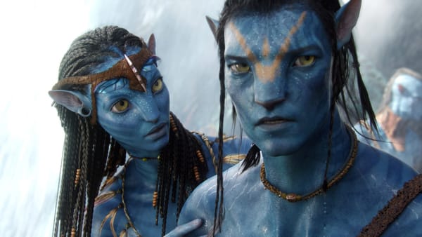 Zoe Saldana and Sam Worthington as Na'vi in Avatar.
