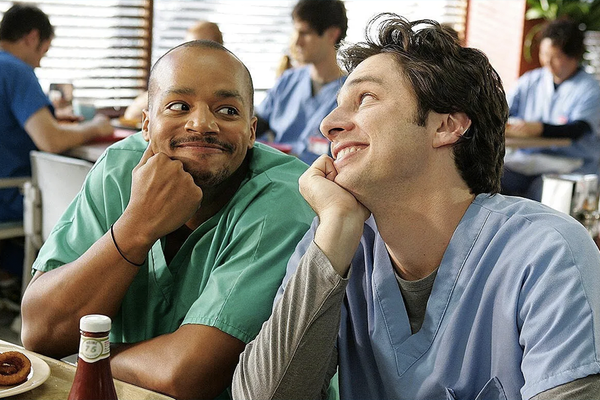 Donald Faison and Zach Braff as Turk and JD from Scrubs.